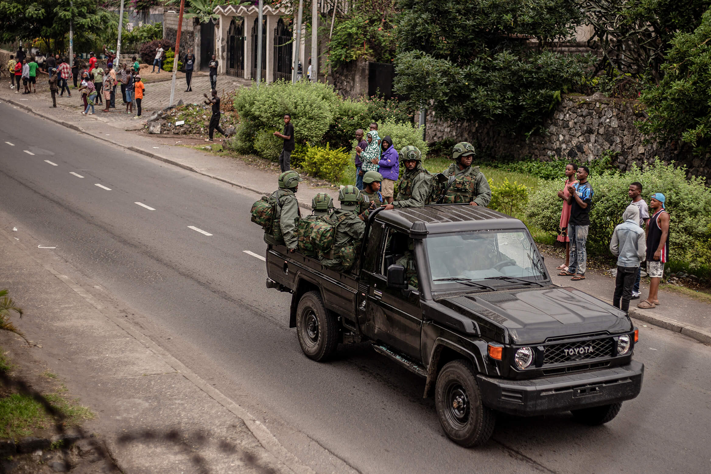 Members of the M23 rebel group travel in a pickup truck as they drive through a street in Goma on 29 January 29,2025. Photo by AFP via Getty Images GettyImages -2195925955