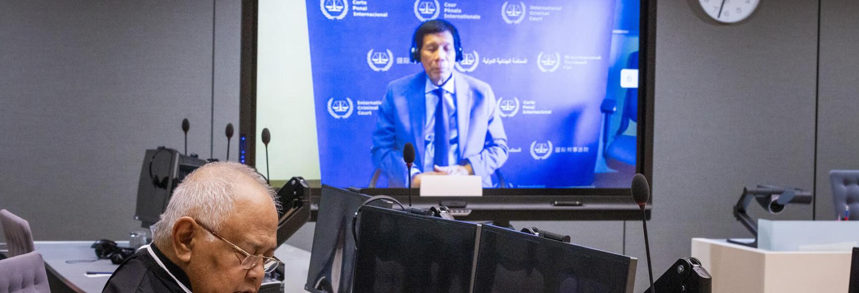 Former Philippine President Rodrigo Duterte faces trial at the International Criminal Court (ICC) for the first time as he attends the hearing via video from the ICC's detention center, while his lawyers were present in the courtroom at the Hague, Netherlands on 14 March 2025. 