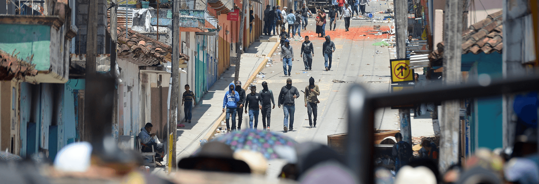 Residents and members of the El Machete self-defense group in Pantelho, Mexico, look for gang members and municipal authorities during a protest against the growing violence in the area.