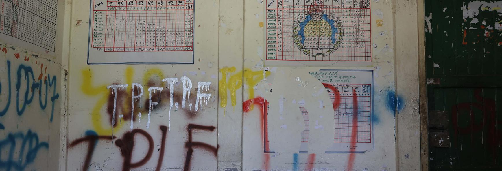Tigray People's Liberation Front graffiti is seen spray-painted on the walls of an administrative office at the Mersa Elementary School in North Wollo, Ethiopia, in 2022. Photo by J. Countess via Getty Images