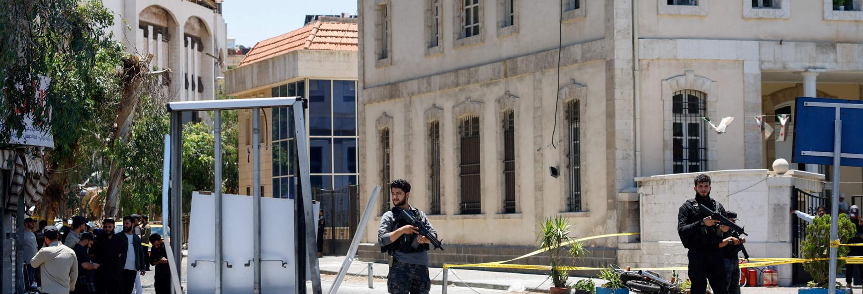 A cordoned-off area and a damaged structure in the aftermath of explosions near a hotel where French President Emmanuel Macron was meant to be staying in Damascus, Syria, 7 July 2026.