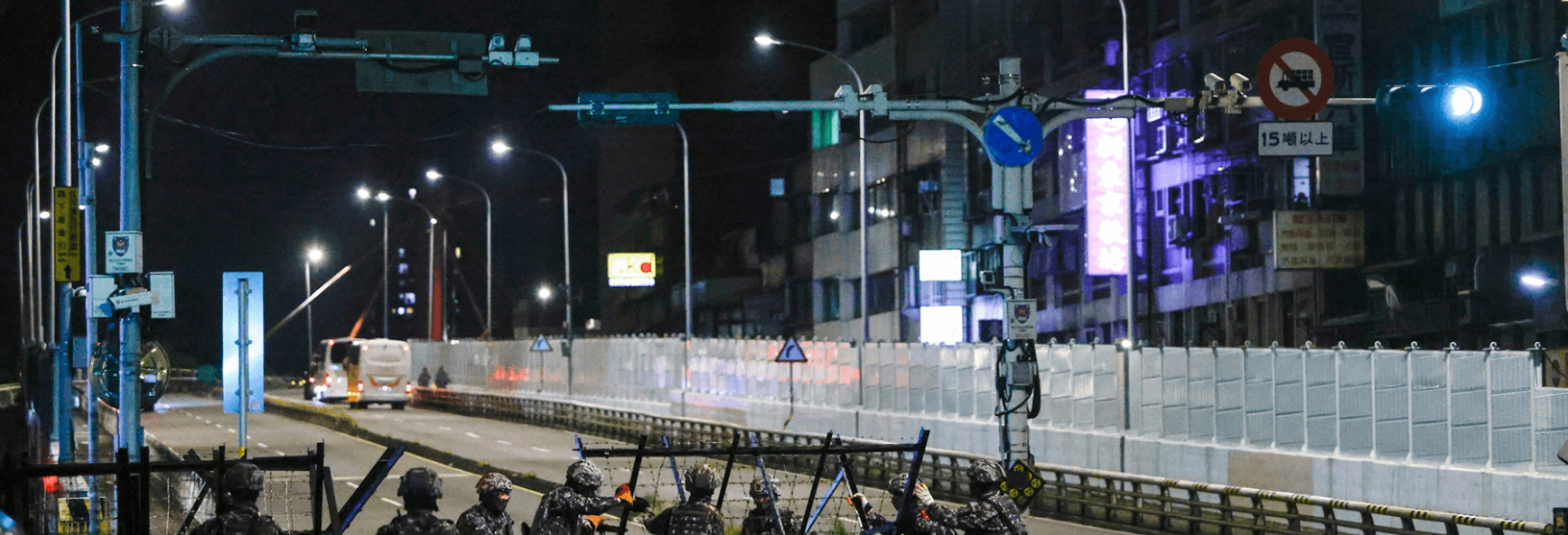 Photo - Taiwanese Military Police personnel install road blockades during a drill as part of the annual Han Kuang military exercises in Taipei, Taiwan, 12 August 2026. 