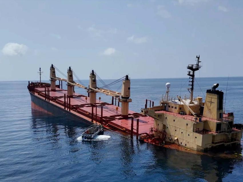 This handout photo provided by Yemeni Al-Joumhouria TV, shows the British-registered cargo ship 'Rubymar' sinking, after it was targeted by Yemen's Houthi forces in international waters in the Red Sea, on March 3, 2024, in the Red Sea. 