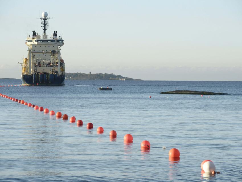 This picture taken on October 12, 2015 shows the C-Lion1 submarine telecommunications cable being laid to the bottom of the Baltic Sea by cable laying ship 'Ile de Brehat' off the shore of Helsinki, Finland
