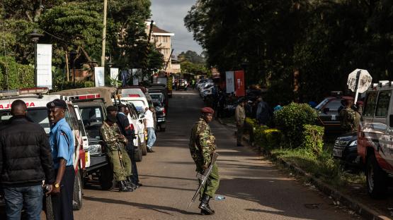 A soldier walks across the road leading to the Dusit Hotel on 16 January 2018 in Nairobi, Kenya. A security operation continued into a second day after Al-Shabab militants stormed the hotel.