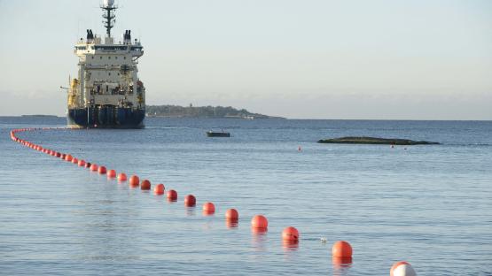 This picture taken on October 12, 2015 shows the C-Lion1 submarine telecommunications cable being laid to the bottom of the Baltic Sea by cable laying ship 'Ile de Brehat' off the shore of Helsinki, Finland