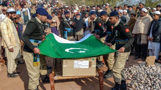 Pakistan’s army personnel take part in a funeral ceremony of a soldier killed in an attack in the Makeen area of Khyber Pakhtunkhwa province on 22 December 2024.