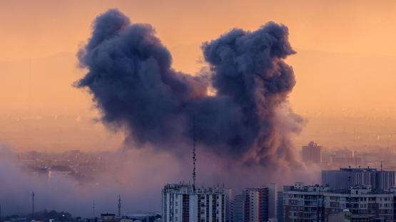  A plume of smoke rises after a strike on the Iranian capital Tehran, on 3 March 2026. Photo by ATTA KENARE / AFP via Getty Images