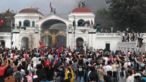 Protesters gather at the main administrative building in Kathmandu, Nepal, on 9 September 2025, a day after a police crackdown on demonstrations over the government's social media prohibitions and corruption. 