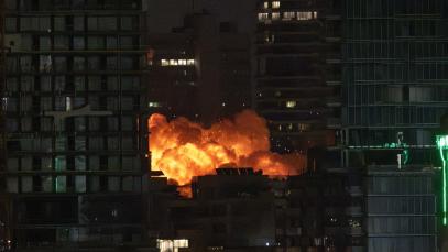 TEL AVIV, ISRAEL - JUNE 16: Smoke and flame rise after Iranian strikes hit a building as Iran's ongoing retaliatory attacks with ballistic missiles towards Israel are seen from Tel Aviv, Israel on June 16, 2025.