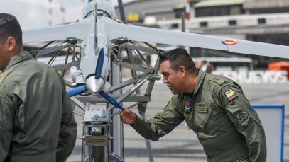 Colombian military personnel set up a drone during Feria Aeronautica Internacional 2019 &mdash;  Colombia's international aeronautical fair &mdash; at Jos&eacute; Mar&iacute;a C&oacute;rdova International Airport in Rionegro, Colombia, on 11 July 2019. Photo by Staff Sgt. Megan Floyd/US Air National Guard photo