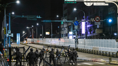 Photo - Taiwanese Military Police personnel install road blockades during a drill as part of the annual Han Kuang military exercises in Taipei, Taiwan, 12 August 2026. 