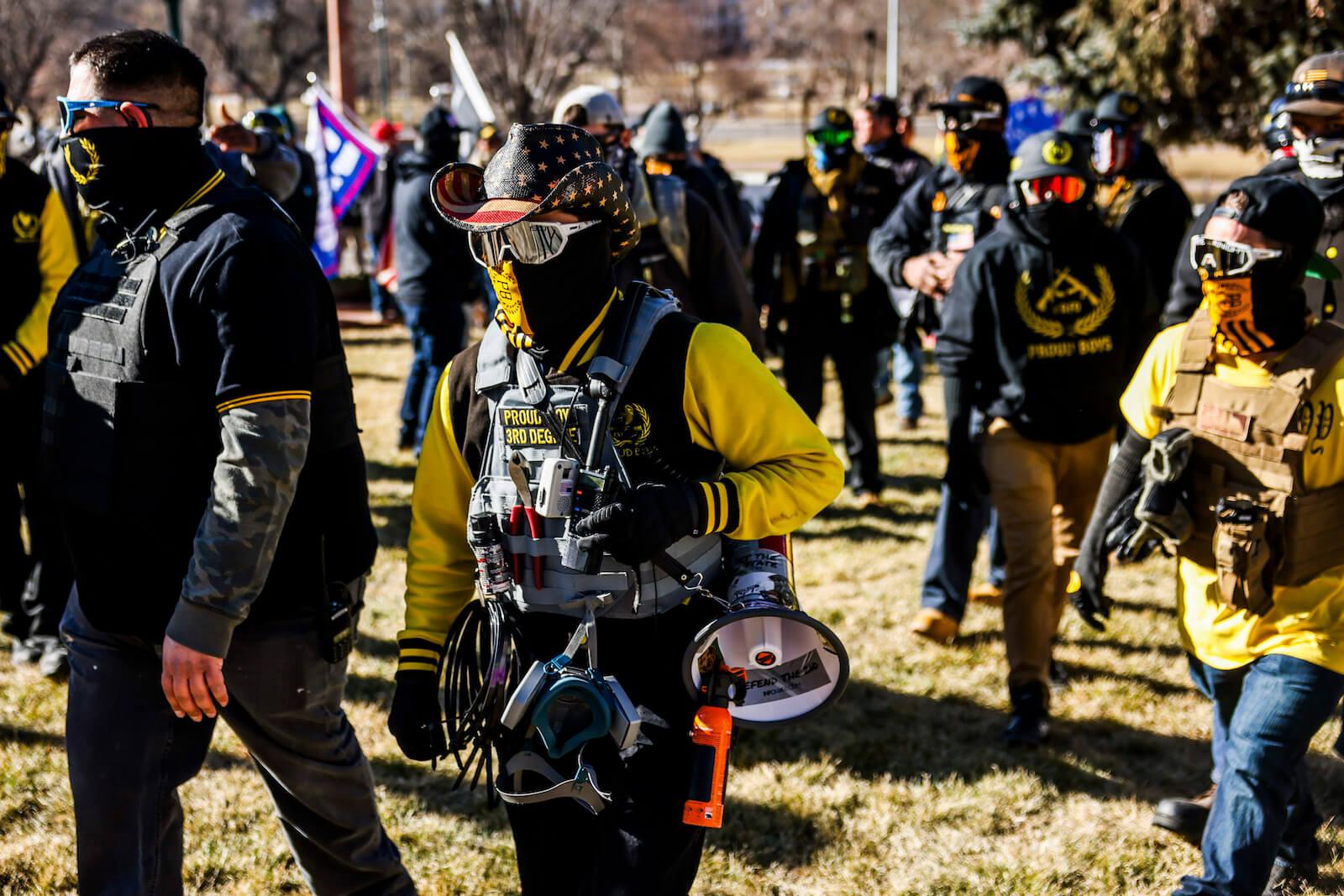 Members of the Proud Boys join Donald Trump supporters as they protest the election outside the Colorado State Capitol on January 6 2021 in Denver, Colorado.