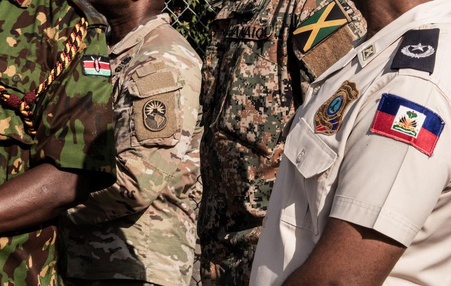 Kenyan police officers arrive at Toussaint Louverture International Airport in Port-au-Prince on 8 December 2025.